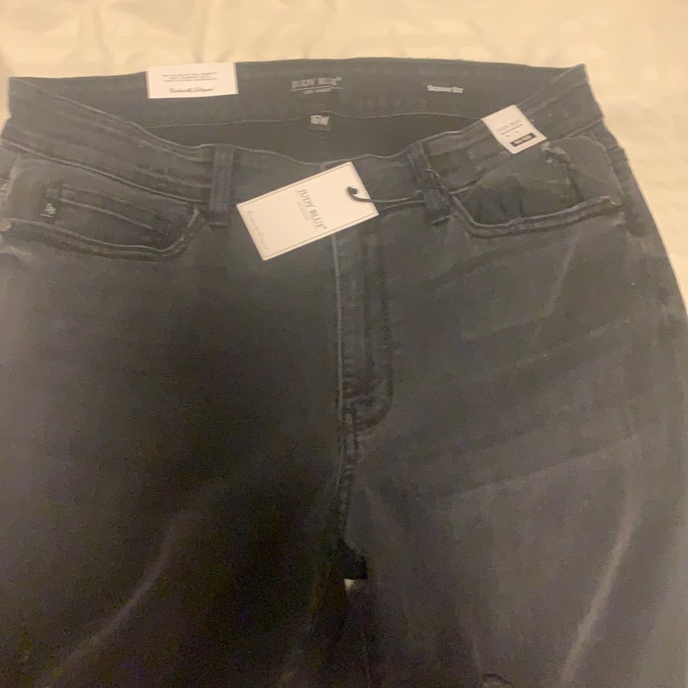 Judy blue black jeans with Buffalo plaid patches.